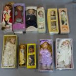 a collection of 12 ceramic dolls, in their original boxes, mostly from Leonardo Collection