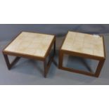 A pair of mid 20th century teak tile top tables, with fern design to tops, H.42 W.65 D.65cm (2)