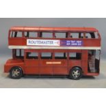A model of a London Route Master bus, unframed, H.28 W.50 D.16cm