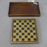 A 19th century Islamic hinged backgammon/chess/chequers games board, with Khatam inlay in wood,