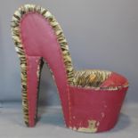 A 20th century chair modelled as a high heel shoe, with faux tiger skin upholstery, H.103cm