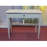 A painted side table fitted with frieze drawer on square tapering supports. H.77 W.91 D.47cm