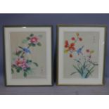 A pair of 20th century fine silk paintings, one of a bluebird and pink Hibiscus flowers, the other
