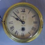 A Ship?s Bulkhead Clock, Astral 8 days Marine brass, by Smith, circa 1935