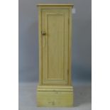 A pine pedestal cupboard, with single cupboard door, H.108 W.37 D.39cm