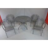 Garden Dining Table with four chairs, H 73 cm diameter 105 cm