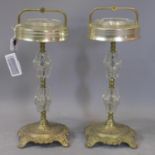 A 20th century pair of ashtrays on stands, Glass, brass and aluminium H 52 W 31 cm