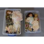 Collection of ceramic dolls and handmade clothes, approx 25, late 20th century.