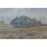 A framed and glazed watercolour, East Wittering, signed G H Rhoades (1898-1980) H.34 W.48cm