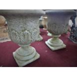 A pair of reconstituted stone planters, decorated with acanthus leaves, H.62cm Diameter 59cm