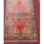 A North-West Persian Lillihan rug, central floral medallion with four corner floral spandrels on a