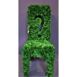 An unusual green chair with all over green vinyl decoration, H.121cm