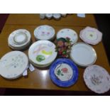A collection of plates, to include Lourioux Foecy plates decorated with flowers; a Paragon plate