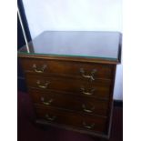 A 20th century mahogany chest of four graduating drawers, with glass top, raised on bracket feet,