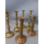 Three pairs of brass candlesticks, 20th century
