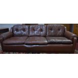 A 20th century three seater brown leather sofa, with label for Gimson Slater Limited to reverse, H.