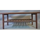 A mid 20th century teak coffee table with under tier rack, H.50 W.123 D.46cm
