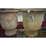 A pair of large fired clay Provence urn style planters, H.68cm Diameter 60cm