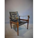 A campaign chair with leather seat and backrest, H.77 W.57 D.66cm