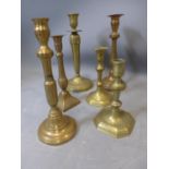 Six mixed brass candlesticks, 20th century