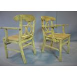 A pair of distressed painted armchairs, raised on outswept legs, H.68cm (2)