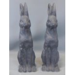 A pair of terracotta seated rabbits, H.69cm