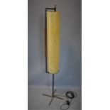 A mid 20th century floor standing lamp, with cylindrical velum shade, H.138cm