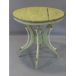 A distressed painted circular table, on outswept legs, H.69cm Diameter 69cm
