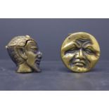 Two brass vesta cases: one in the form of a smiling moon 4.2cm, one in the form of a grinning