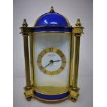 A 20th century West German gilt brass and blue enamel mantle clock signed 'Phaeton by Acctim' to