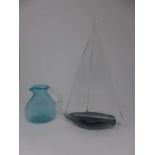 A glass ship, indistinctly signed, H.36 W.23cm, together with a glass jug, H.14cm