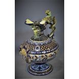 A large Austrian jug, with mythical beast to handle, horned man to spout, crest and floral panels to