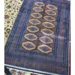 A Pakistani Bokhara rug, repeating goul motifs within geometric borders, 190 x 122cm