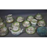 A hand painted tea service by Thomas Goode, comprising tea pot (1), creamer (2), tea cups (8),