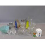 An assorted collection of glassware, to include vases, decanter, turquoise glass bowl, cut glass jug