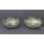 Two silver Chinese pierced bowls by Wang Hing & Co., with pierced decoration of flowers and foliage,