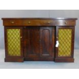 A Regency mahogany breakfront side cabinet, having one central long drawer flanked by two short