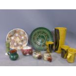 A collection of contemporary glazed stoneware, 20th century vernacular craft, comprising three mugs,