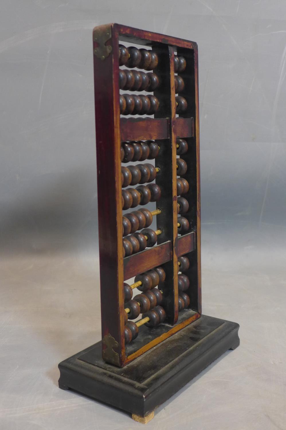 Early 20th century Chinese abacus, steel, bamboo and, wood, H.42 x W.24 x D.13 cm This is an - Image 2 of 2