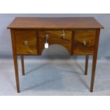 A 19th century mahogany desk, with one shallow and two deep drawers, on square tapered legs, H.80