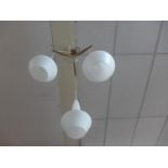 Contemporary light fitting with three drop shape frosted glass shades