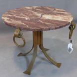 A Spanish round coffee table, c.1940, on wrought iron base with ring details and having burgundy