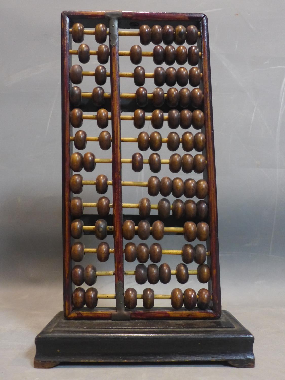 Early 20th century Chinese abacus, steel, bamboo and, wood, H.42 x W.24 x D.13 cm This is an