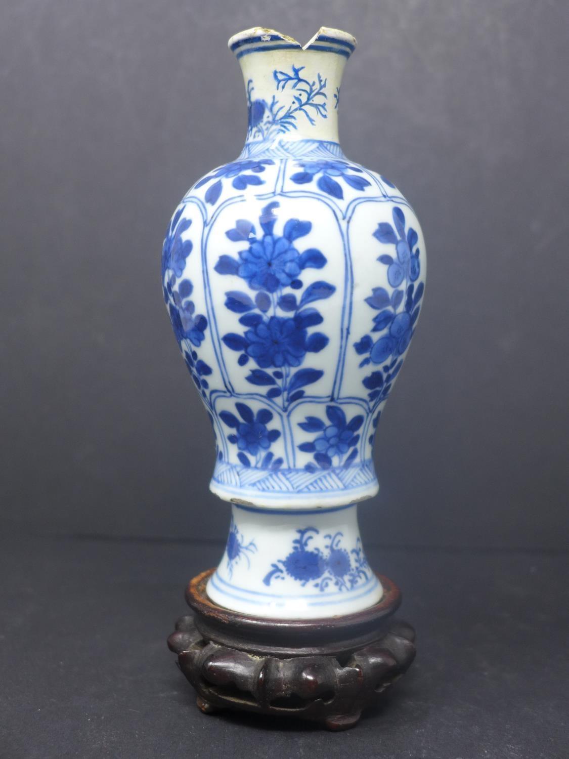 A Chinese baluster vase, blue and white porcelain, floral design probably K?ang Hsi period with - Image 2 of 4