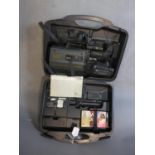 A vintage Panasonic S-VHS Movie Camera and Playback NV-MS2 HQ, cased and with a VHS tape, with
