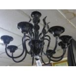 A black Murano glass chandelier, eight arms, eight leaves, H. 65cm, Diameter 85cm