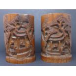 Two late 19th century Chinese bamboo brush pots, c.1860, relief carved with figures in a pagoda in