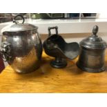 A collection of pewter wares, including a 19th century tobacco jar by John Warne, a early 20th