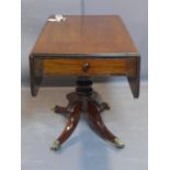 A Victorian mahohany Pembroke table on single pedestal with drawer, H.70, W. 110, D. 100