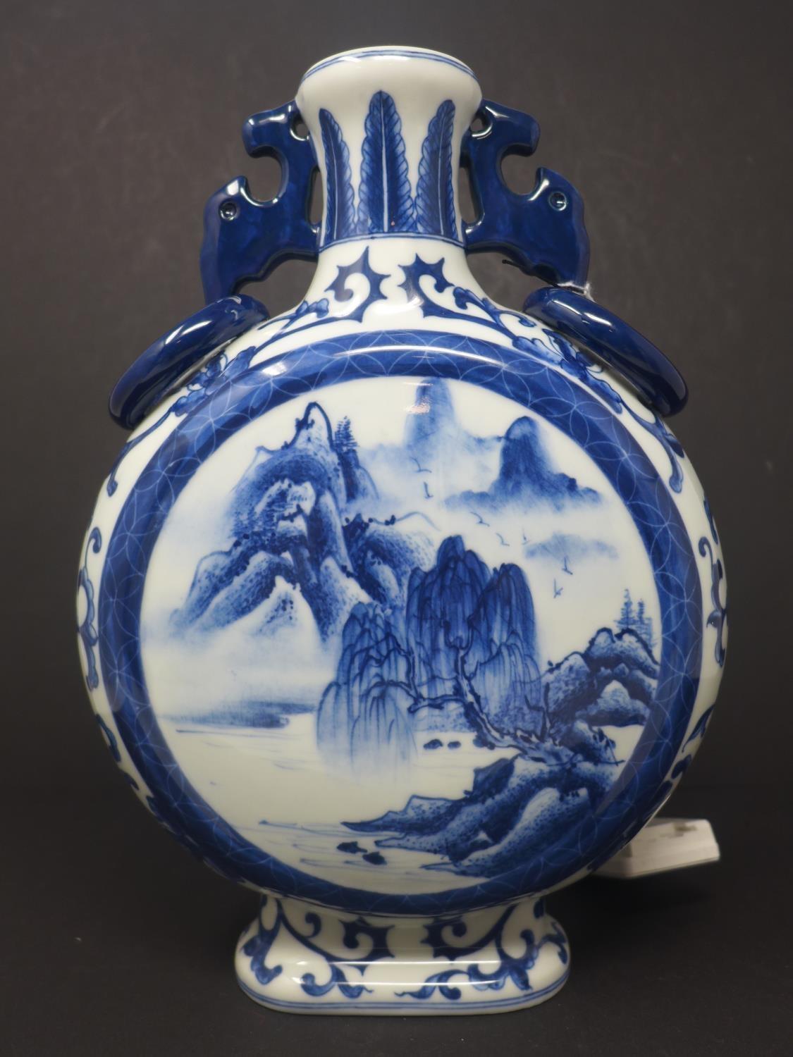 A Chinese blue and white twin handled moon flask, decorated with circular panel depicting a - Image 2 of 3